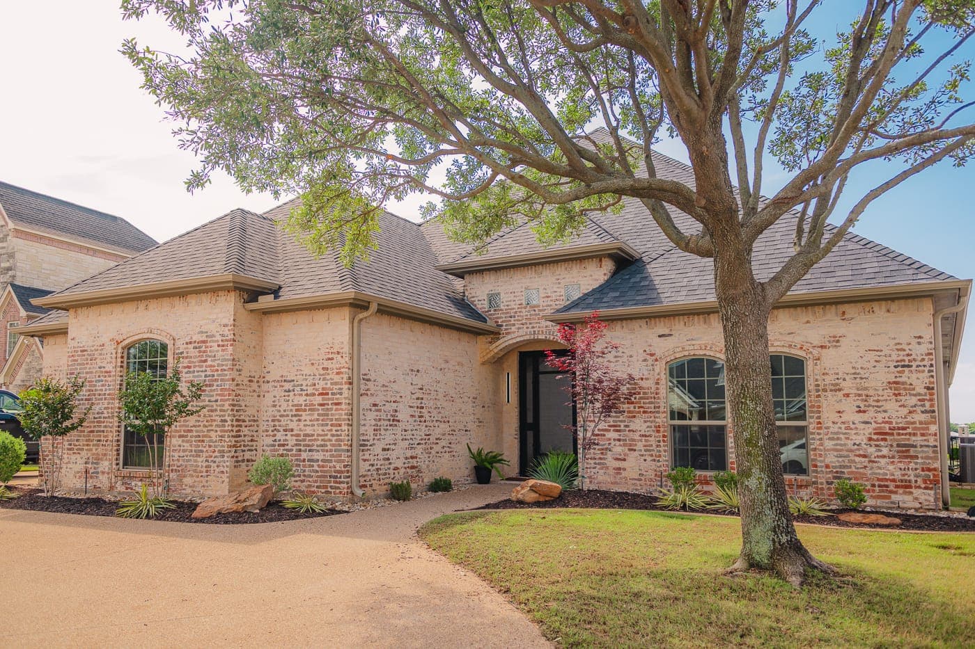 Front elevation and new landscaping after a whole-house renovation