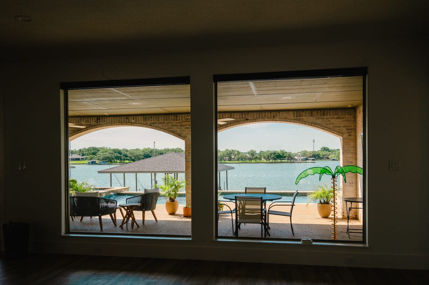Sliding glass doors opening from the living space onto a covered patio
